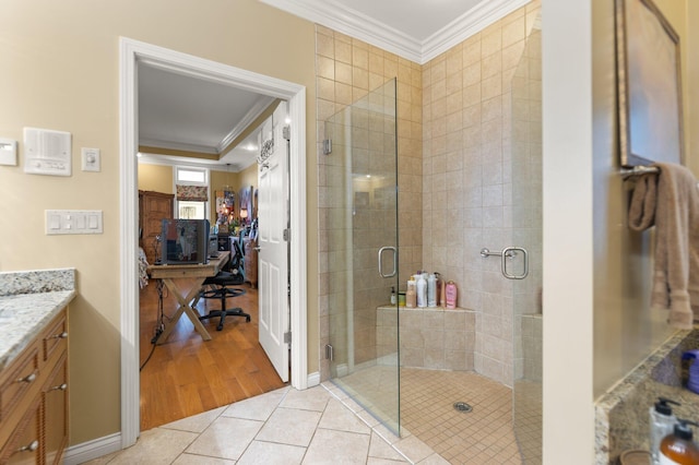 137 Indian Cave Subdivision, Monticello, KY 42633 - bathroom featuring crown molding, vanity, a shower stall, tile patterned flooring, and baseboards