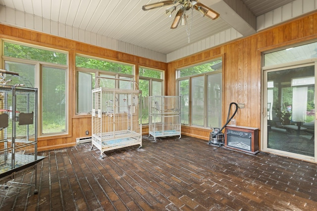 137 Indian Cave Subdivision, Monticello, KY 42633 - sunroom with wood walls, healthy amount of natural light, a wooden deck, and a baseboard heating unit