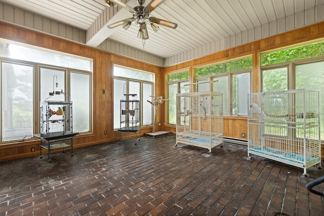 137 Indian Cave Subdivision, Monticello, KY 42633 - unfurnished sunroom featuring wood walls, a baseboard heating unit, brick flooring, and french doors