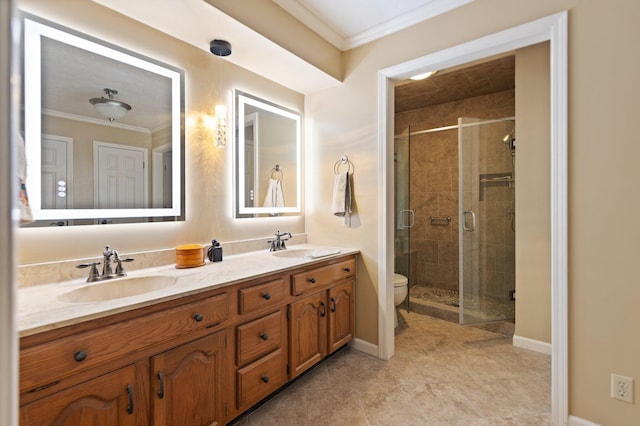137 Indian Cave Subdivision, Monticello, KY 42633 - bathroom with ornamental molding, double vanity, toilet, a stall shower, and baseboards