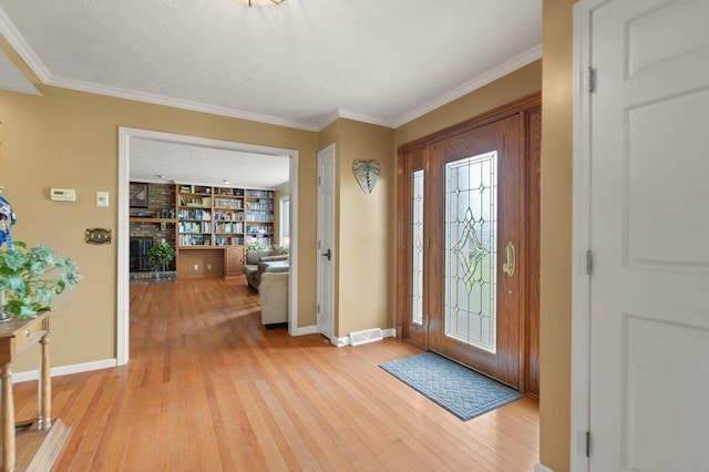 137 Indian Cave Subdivision, Monticello, KY 42633 - foyer with light wood-type flooring, baseboards, and crown molding