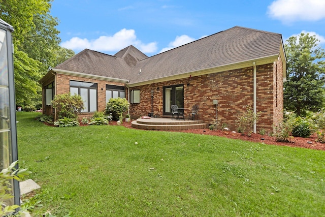 137 Indian Cave Subdivision, Monticello, KY 42633 - view of front of property featuring brick siding, a front yard, and a shingled roof