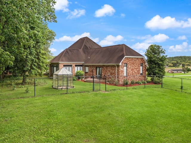 137 Indian Cave Subdivision, Monticello, KY 42633 - rear view of property featuring brick siding and roof with shingles