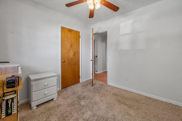 1976 Greenleaf Dr, Lexington, KY 40505 - unfurnished bedroom featuring light colored carpet, baseboards, and ceiling fan