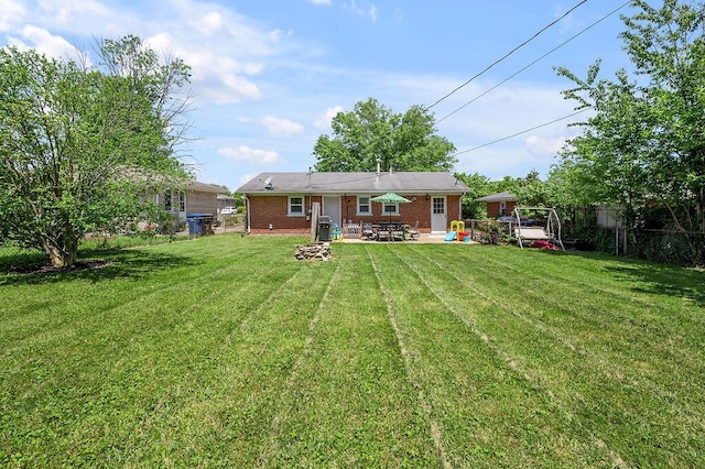 1976 Greenleaf Dr, Lexington, KY 40505 - back of house featuring a patio area and brick siding