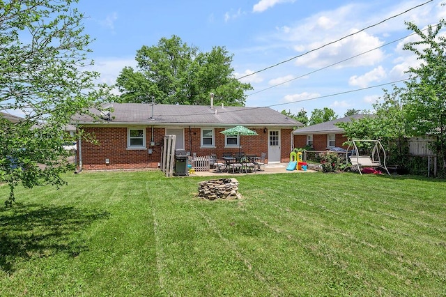 1976 Greenleaf Dr, Lexington, KY 40505 - back of property with a patio and brick siding