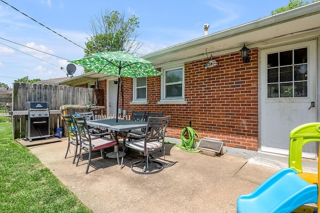 1976 Greenleaf Dr, Lexington, KY 40505 - view of patio / terrace featuring grilling area, a playground, and outdoor dining area
