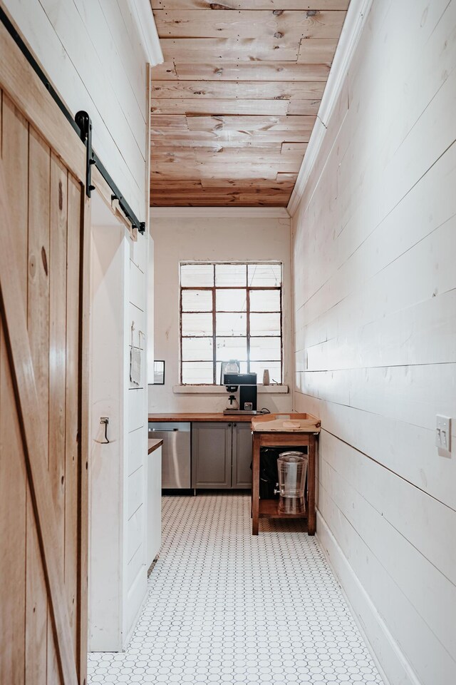 241 Old Glory Rd, Monticello, KY 42633 - kitchen featuring gray cabinetry, butcher block counters, dishwasher, a sink, and wood walls