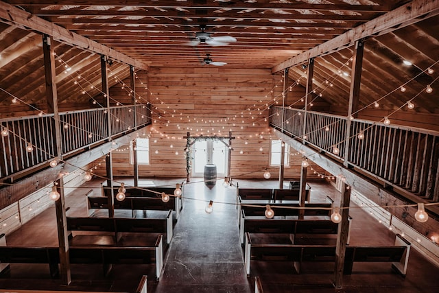 241 Old Glory Rd, Monticello, KY 42633 - unfurnished living room with a ceiling fan, wood walls, and high vaulted ceiling