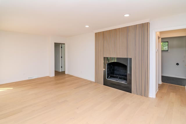 2933 Montavesta Rd, Lexington, KY 40502 - unfurnished living room with wood finished floors, a fireplace, recessed lighting, and baseboards