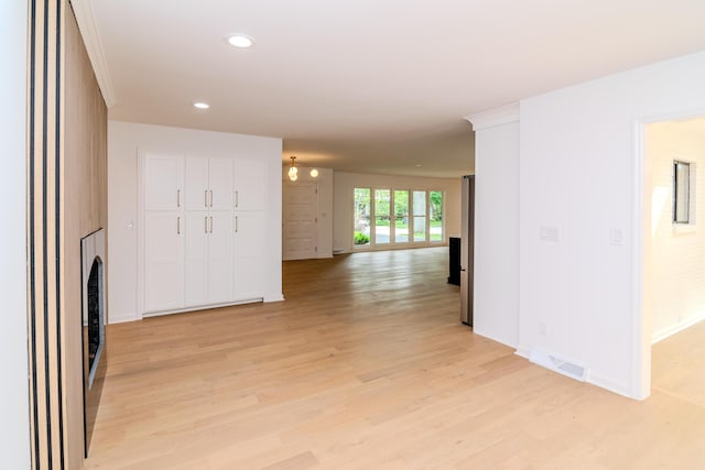 2933 Montavesta Rd, Lexington, KY 40502 - unfurnished living room featuring light wood finished floors, baseboards, and recessed lighting