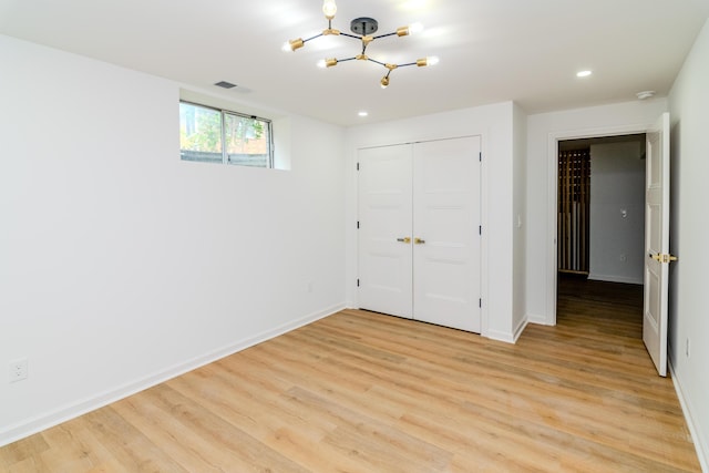 2933 Montavesta Rd, Lexington, KY 40502 - unfurnished bedroom with a chandelier, light wood finished floors, a closet, recessed lighting, and baseboards
