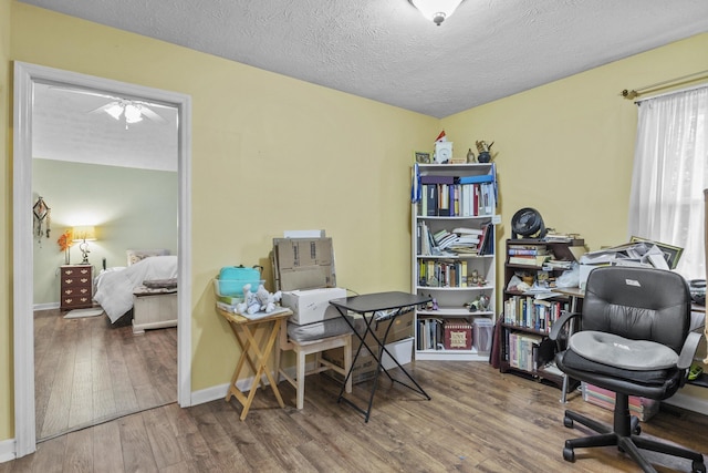 3744 Appian Way, Lexington, KY 40517 - office space featuring wood finished floors, a textured ceiling, and ceiling fan