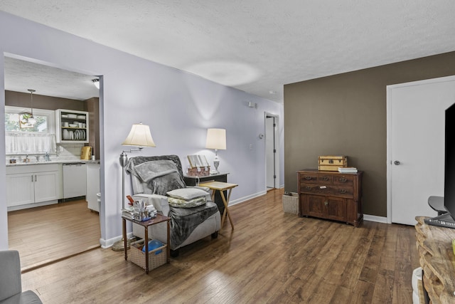 3744 Appian Way, Lexington, KY 40517 - living area with wood finished floors and a textured ceiling