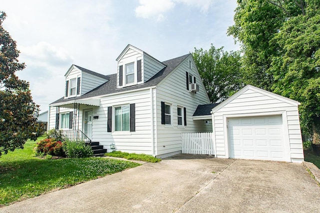 135 Rolling Acres Dr, Frankfort, KY 40601 - cape cod-style house with driveway, a garage, and roof with shingles