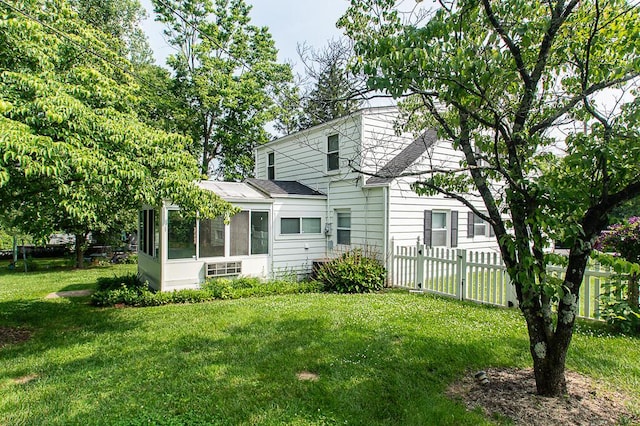 135 Rolling Acres Dr, Frankfort, KY 40601 - rear view of house with a sunroom and a shingled roof