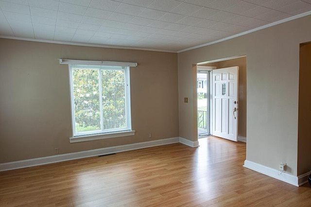 135 Rolling Acres Dr, Frankfort, KY 40601 - empty room with ornamental molding, light wood-style floors, and baseboards