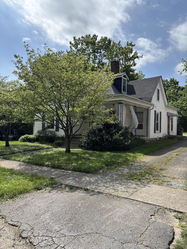 321 Clay Ave, Lexington, KY 40502 - view of property exterior with a chimney