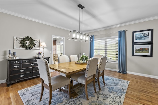 594 Earlymeade Dr, Winchester, KY 40391 - dining room with baseboards, ornamental molding, light wood-style flooring, and a chandelier
