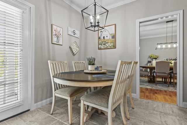 594 Earlymeade Dr, Winchester, KY 40391 - dining area with crown molding, a chandelier, and baseboards