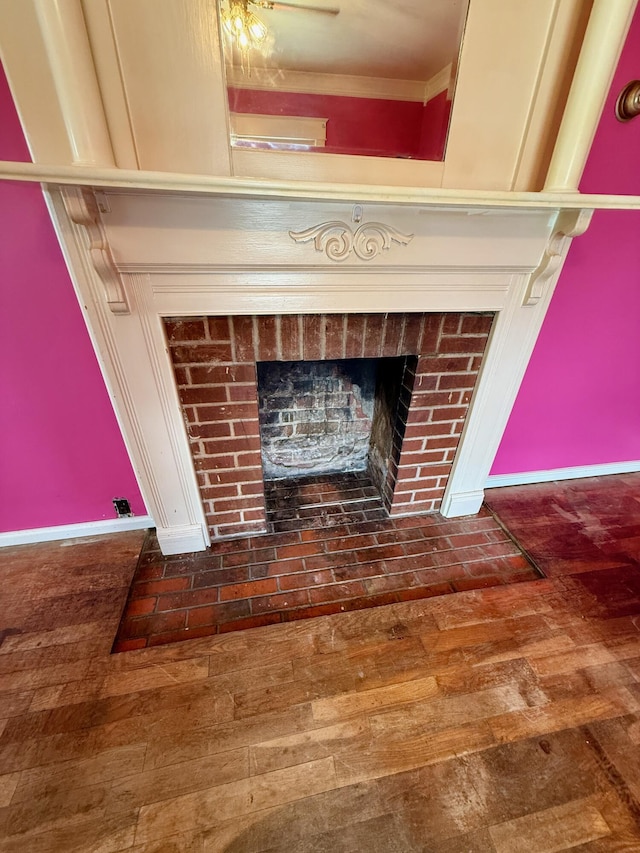 215 Bellevue Ave, Wilmore, KY 40390 - detailed view of a brick fireplace and wood finished floors