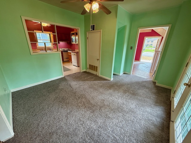 215 Bellevue Ave, Wilmore, KY 40390 - unfurnished living room with ceiling fan, carpet floors, and an office area