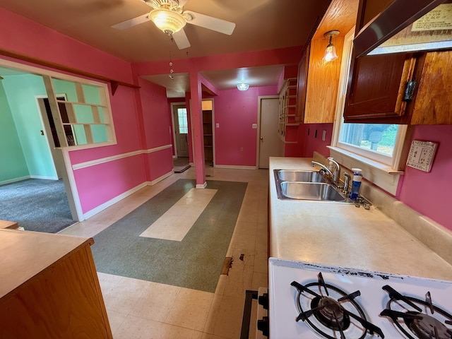 215 Bellevue Ave, Wilmore, KY 40390 - kitchen featuring ceiling fan, light floors, light countertops, and range