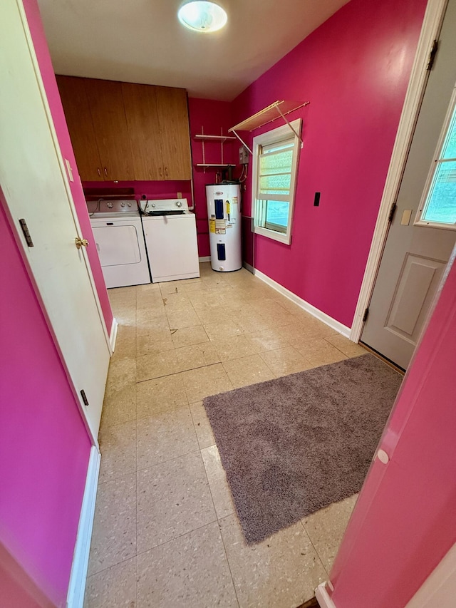 215 Bellevue Ave, Wilmore, KY 40390 - washroom with water heater, washing machine and clothes dryer, cabinet space, and healthy amount of natural light