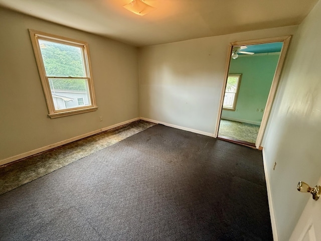 215 Bellevue Ave, Wilmore, KY 40390 - spare room with dark colored carpet and a ceiling fan