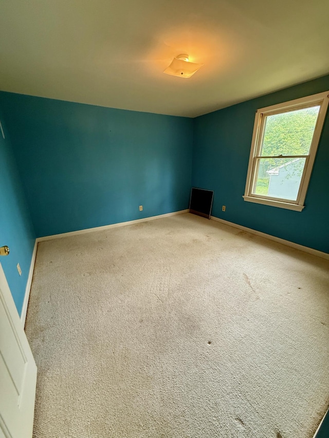 215 Bellevue Ave, Wilmore, KY 40390 - carpeted empty room with baseboards