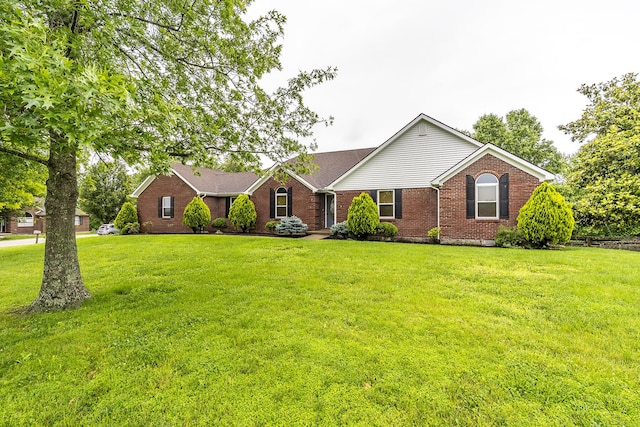 1324 Travis Dr, Richmond, KY 40475 - ranch-style home featuring brick siding and a front lawn