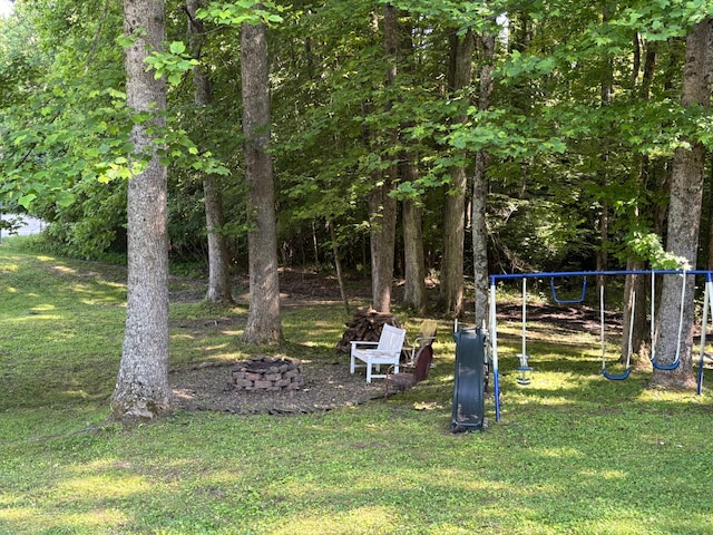 1512 Maple Ln, Corbin, KY 40701 - view of grassy yard featuring a playground