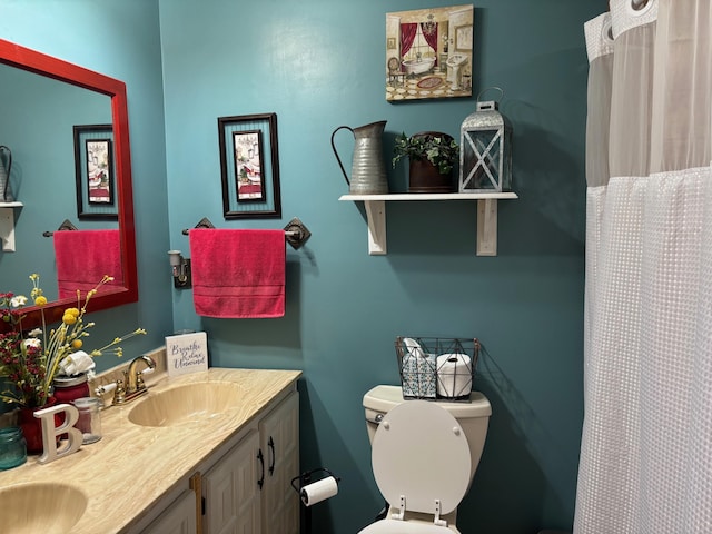 1512 Maple Ln, Corbin, KY 40701 - full bathroom featuring toilet, double vanity, and a shower with curtain