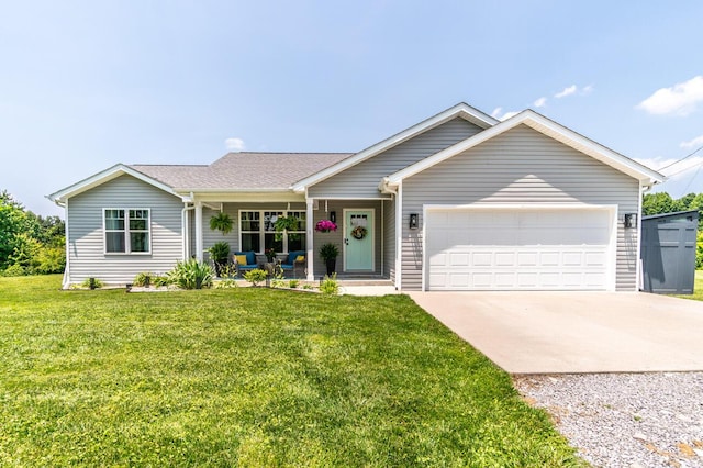 475 Flint Rd, Waco, KY 40385 - ranch-style home featuring concrete driveway, a garage, covered porch, and a front lawn