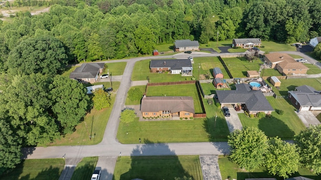 141 Springfield Dr, Corbin, KY 40701 - aerial overview of property's location with a heavily wooded area