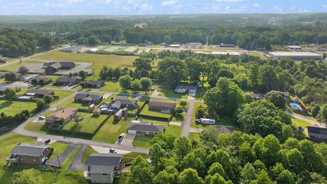 141 Springfield Dr, Corbin, KY 40701 - aerial view of property and surrounding area with a heavily wooded area and nearby suburban area