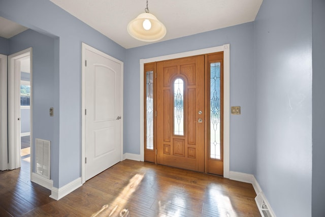 141 Springfield Dr, Corbin, KY 40701 - foyer with dark wood-style flooring and baseboards