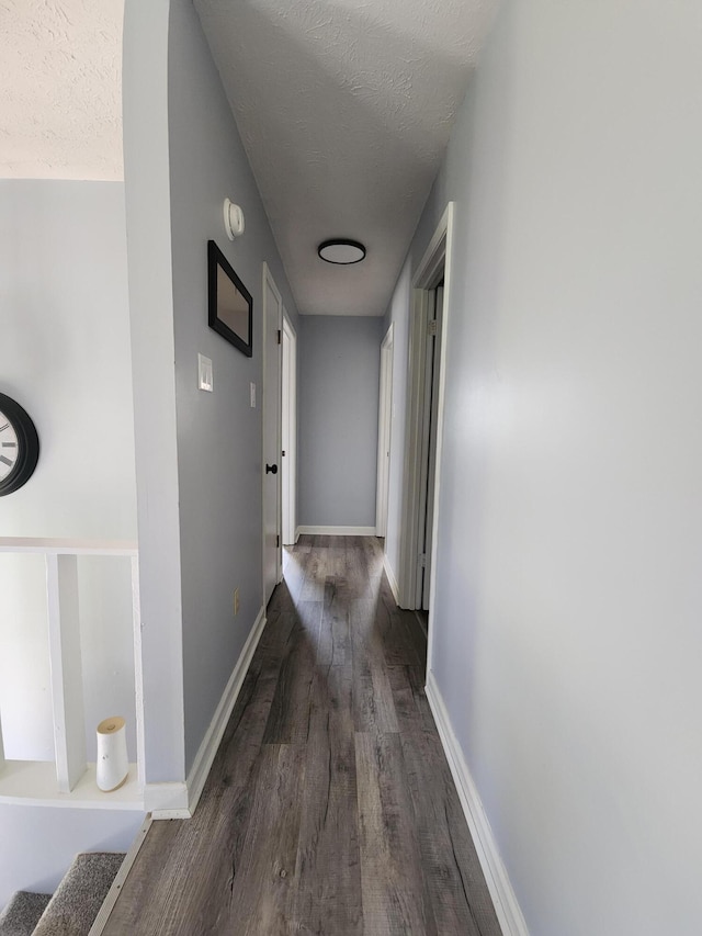50 Ford Dr, Mount Vernon, KY 40456 - hall featuring wood finished floors, a textured ceiling, and baseboards