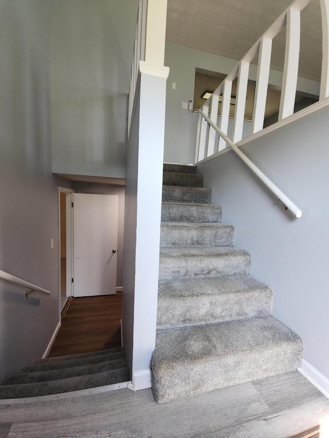 50 Ford Dr, Mount Vernon, KY 40456 - stairway featuring baseboards and carpet flooring