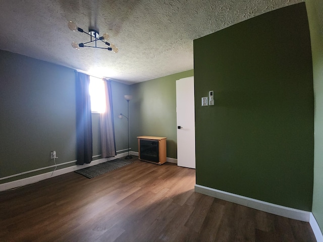 50 Ford Dr, Mount Vernon, KY 40456 - spare room with wood finished floors, baseboards, and a textured ceiling