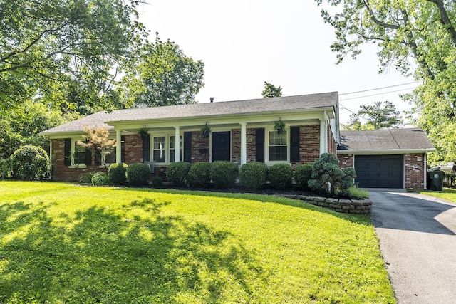 3506 Newport Dr, Lexington, KY 40517 - ranch-style house with brick siding, a front lawn, driveway, and a garage