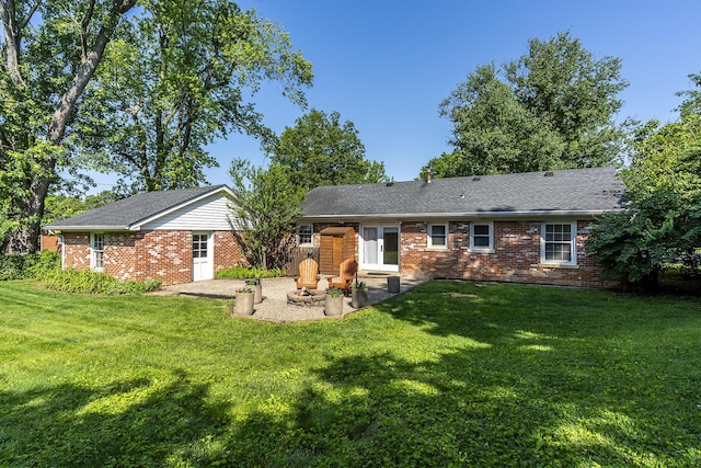 3506 Newport Dr, Lexington, KY 40517 - rear view of property with a patio, brick siding, and a lawn