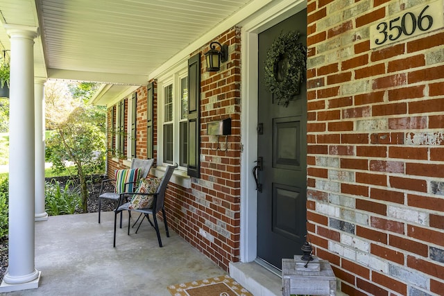 3506 Newport Dr, Lexington, KY 40517 - doorway to property featuring covered porch and brick siding