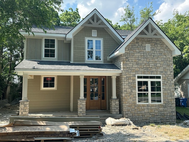 229 Sherman Ave, Lexington, KY 40502 - craftsman-style house featuring stone siding, covered porch, and a shingled roof