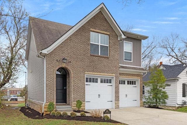 100 Goodrich Ave, Lexington, KY 40503 - traditional-style home with brick siding, a garage, driveway, board and batten siding, and a shingled roof