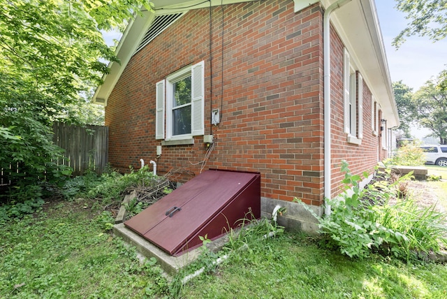 103 Cypress St, Nicholasville, KY 40356 - exterior view of brick siding and a bulkhead entry
