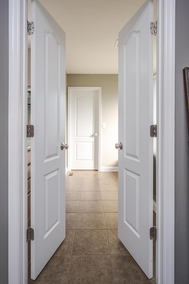 162 Johnstone Trl, Georgetown, KY 40324 - hall with dark tile patterned floors and baseboards