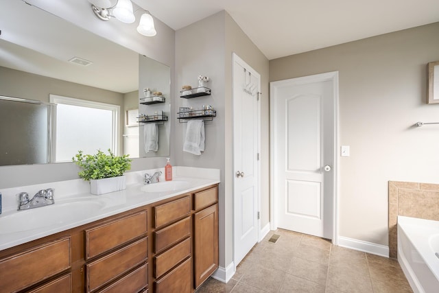 162 Johnstone Trl, Georgetown, KY 40324 - full bath featuring a bath, tile patterned floors, double vanity, and baseboards