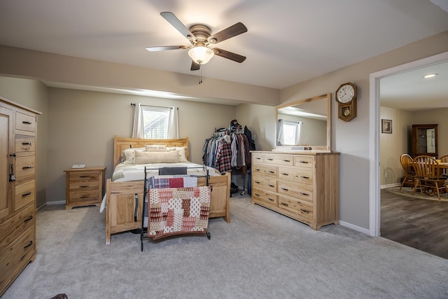 162 Johnstone Trl, Georgetown, KY 40324 - bedroom featuring light colored carpet, multiple windows, a ceiling fan, and baseboards