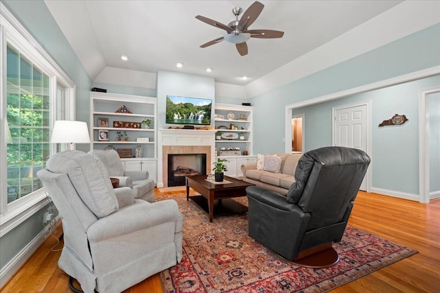 143 Winding View Trl, Georgetown, KY 40324 - living room featuring a fireplace with flush hearth, ceiling fan, wood finished floors, lofted ceiling, and recessed lighting